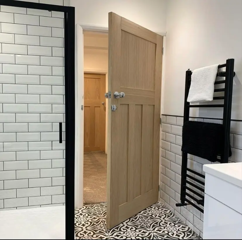 Oak 1930s-style bathroom door with a chrome knob and privacy turn, the handles and privacy locks we supply and fit in Newcastle