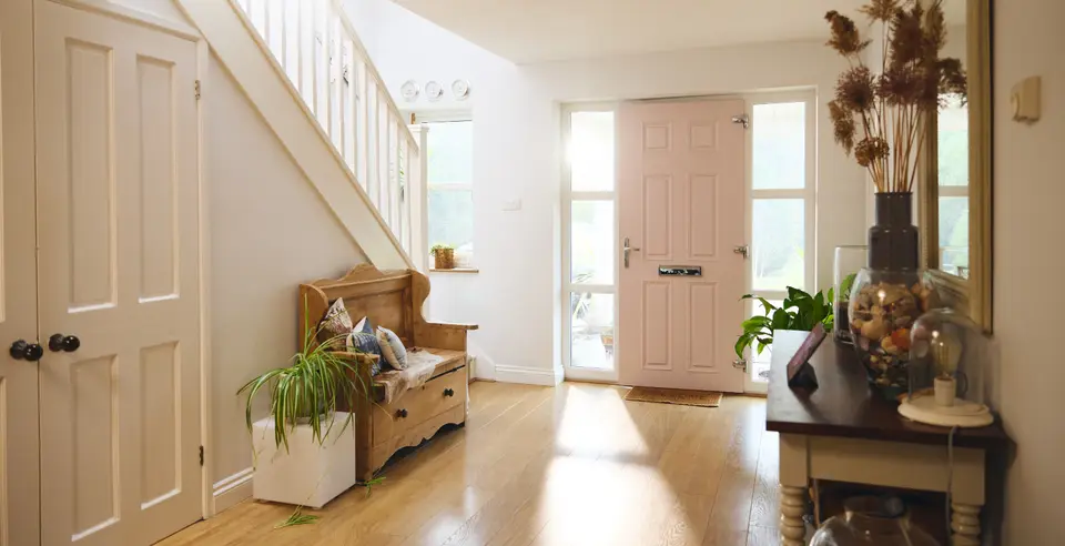 Hallway with white painted panel internal doors, the kind of white door we supply and fit in Newcastle